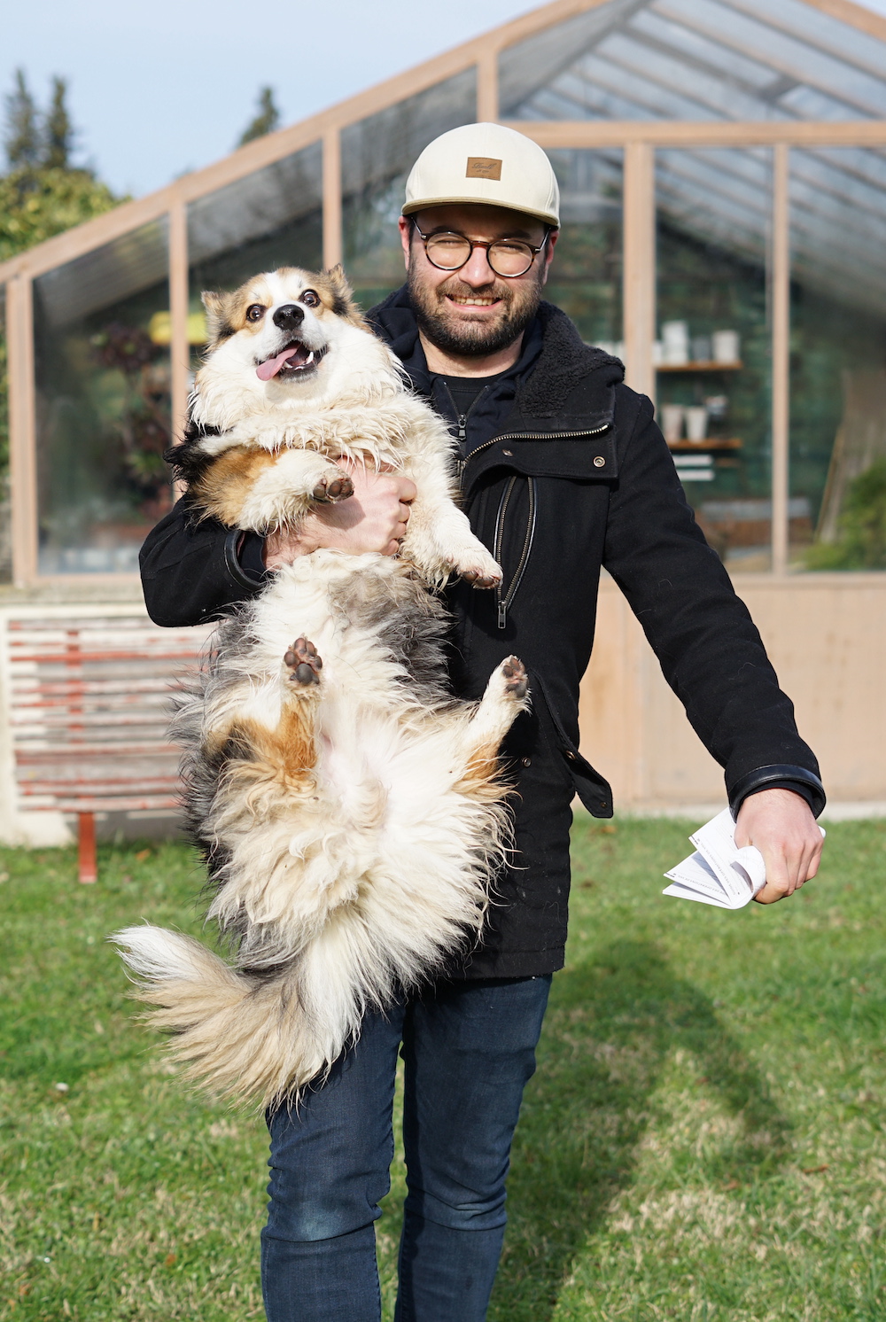 A pic of my dog Romeo in my arms after he tried to eat my dad's toy drone